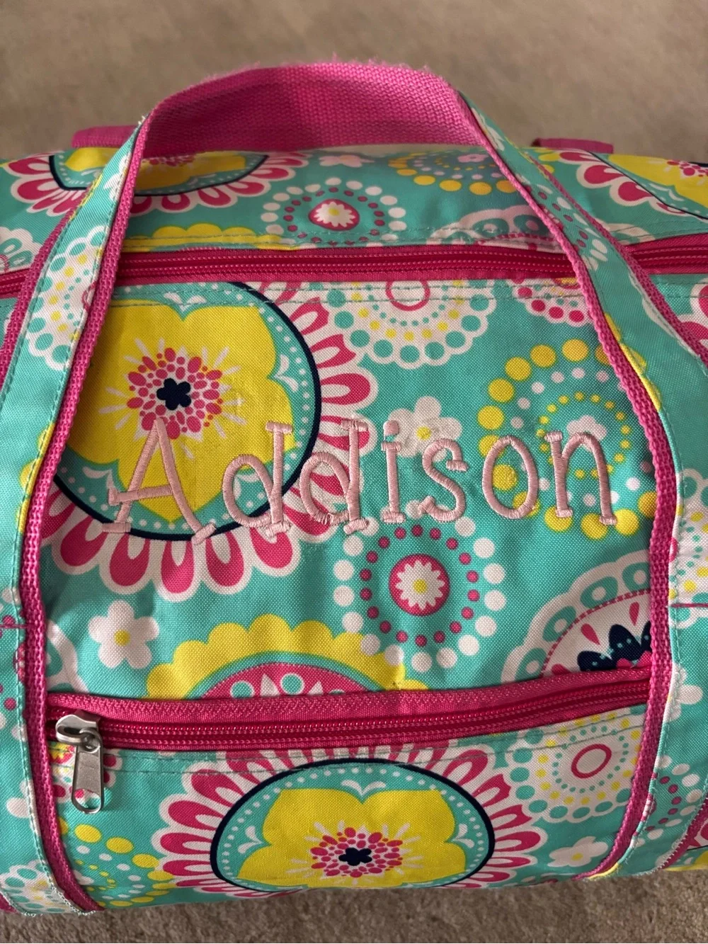 Turquoise Floral Duffle Bag with Pink Trim monogrammed with the name Addison